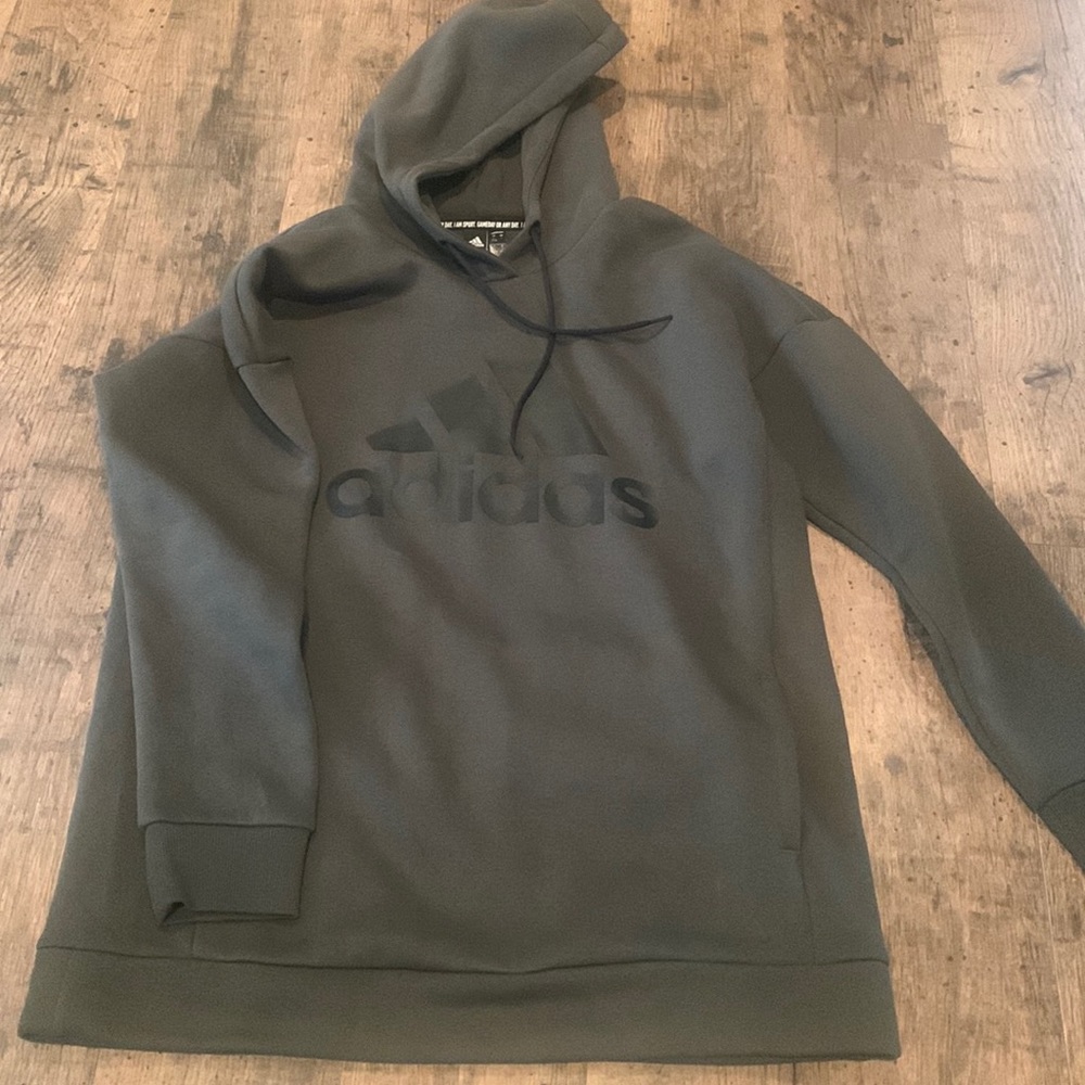 New never worn Adidas hoodie size L